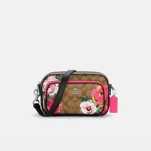 Brand New never used still in plastic Coach bag.